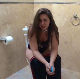 Adriana complains about having to go to the bathroom badly after eating Chili. A loose, wet-sounding poop and a piss is heard as she sits on a toilet. She wipes her ass when finished. No product shown. Presented in 720P HD. Over 4 minutes.